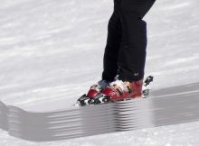 Skifahrer mit SUV-Ski