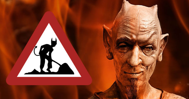 Satan vor Hölle mit 'Achtung Baustelle'-Tafel